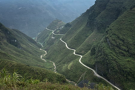 aerial view of mountain with road thumbnail