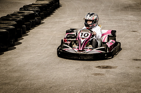 person riding go kart on track thumbnail