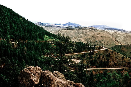 brown rocky cliff mountains with roadway thumbnail