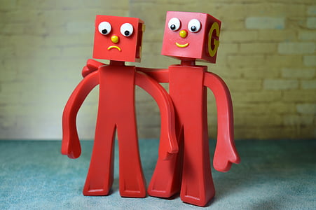photo of two red action figures thumbnail