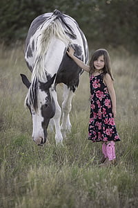 girl holding the horse thumbnail