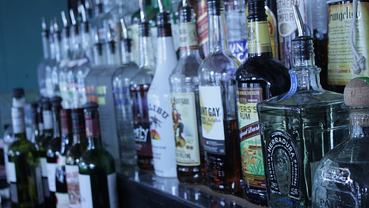 assorted liquor bottle lot thumbnail