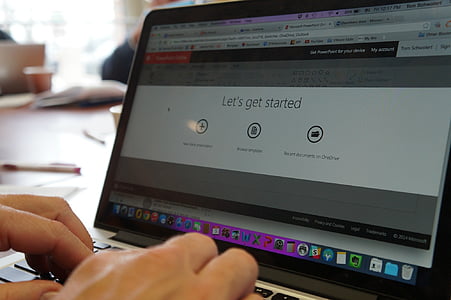 person using MacBook pro thumbnail