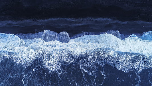 aerial photography of ocean waves thumbnail