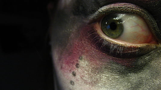 closeup photo of person's right eye thumbnail