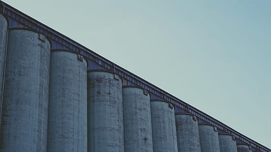 gray concrete building under white sky thumbnail