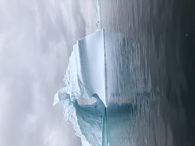 ice berg on body of water thumbnail