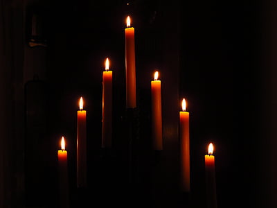 lit red candles thumbnail