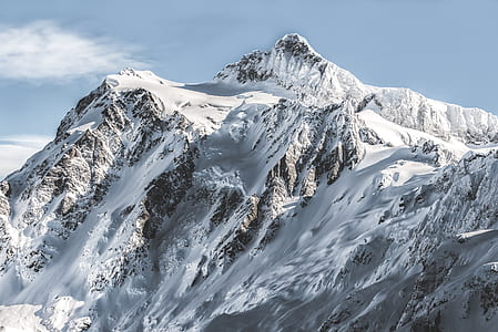 white and gray mountain under white clouds thumbnail