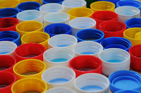 yellow, white, and blue plastic caps thumbnail