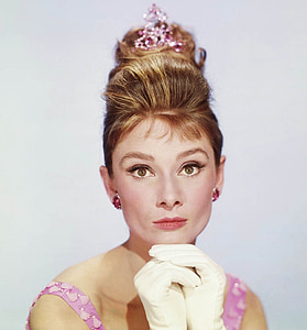 woman wearing crown and white gloves thumbnail