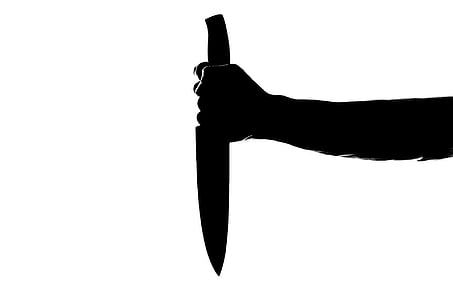 person hand holding a knife no white background thumbnail