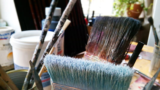 paint brushes on tabletop thumbnail