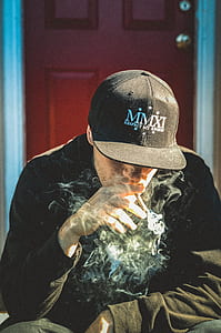 man in black cap thumbnail