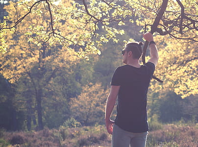 selective focus photography of man in black shirt thumbnail