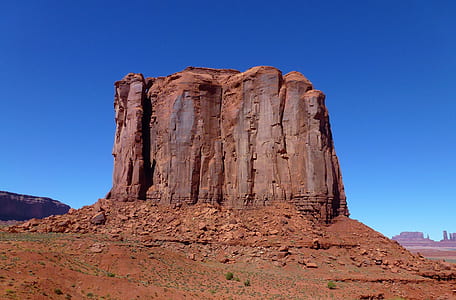 brown rock formation under blue sky thumbnail