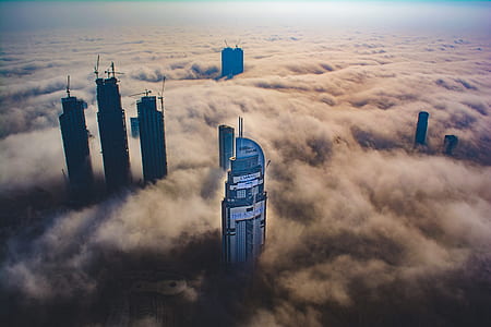 clouds with skyscrapers thumbnail