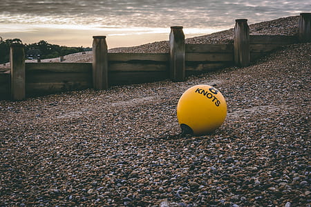 yellow knots floater on seashore thumbnail