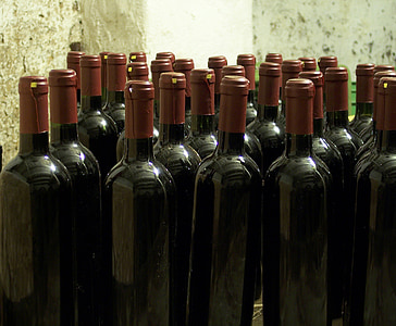 black glass bottles on surface thumbnail