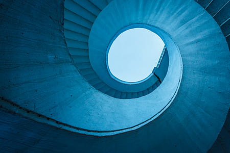 low angle photo of white spiral stair thumbnail