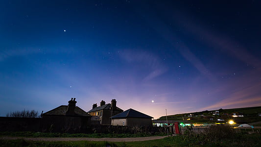 houses under night sky thumbnail