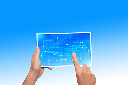 person holding white tablet computer thumbnail
