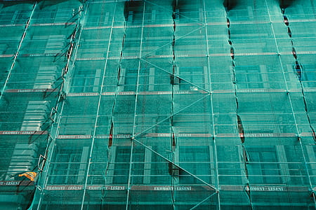 low angle photo of building scaffolding thumbnail