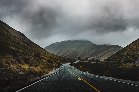 photo of road between mountains thumbnail