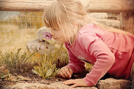 girl wearing pink sweater thumbnail