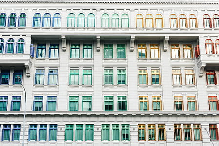 photo of white concrete building during daytime thumbnail