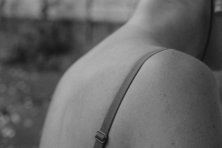 grayscale photo of person's back thumbnail