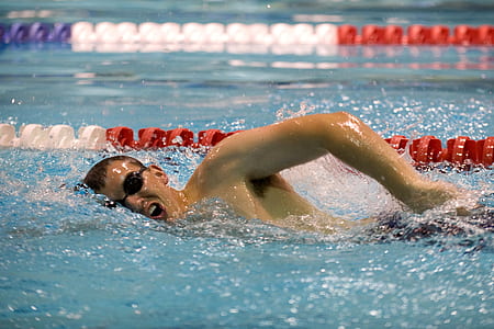 man swimming on pool thumbnail