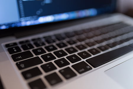 selective focus photography of turned-on MacBook Pro thumbnail