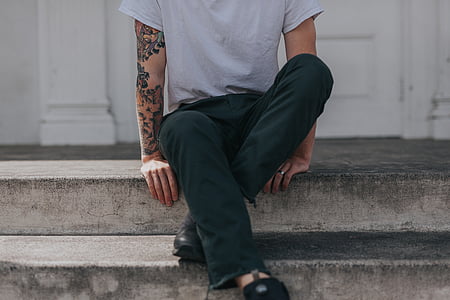 man sitting on staircase thumbnail