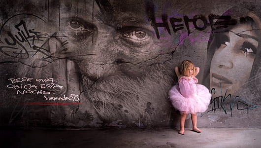 child standing at the back of male poster thumbnail