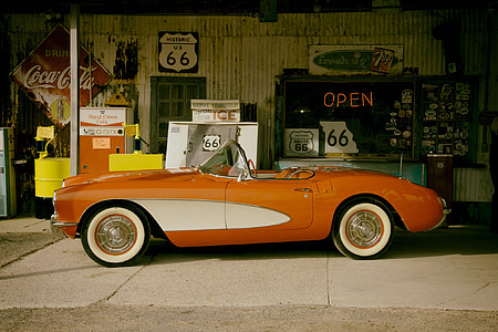 orange and white convertible coupe thumbnail