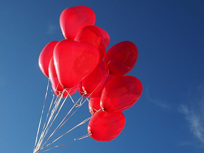 low angle photo of red balloons thumbnail