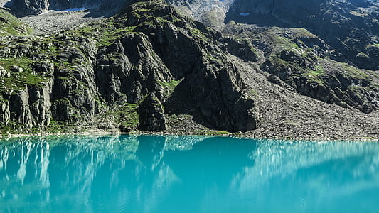 landscape photo of mountain and ocean thumbnail
