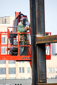 man welding building brace thumbnail