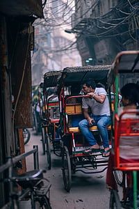 man riding on carriage thumbnail