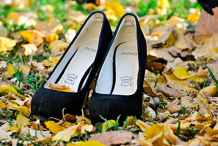 pair of black Novo leather stilettos on green grass field with leaves thumbnail