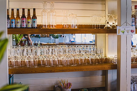Clear Drinking Glass Collection on Shelf thumbnail