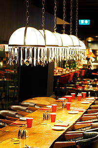 white pendant lamps turned on thumbnail