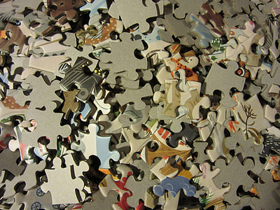 piles of jigsaw puzzles thumbnail