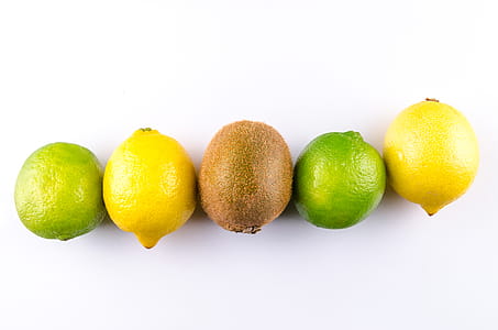 Flat Lay Photo of Two Lemon, Two Limes, and One Kiwi thumbnail