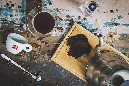 white ceramic teacup near drinking glass thumbnail