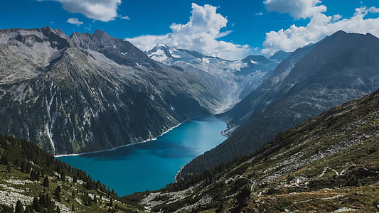 body of water between mountains thumbnail