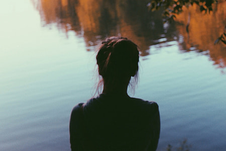 woman's back photography during day time thumbnail