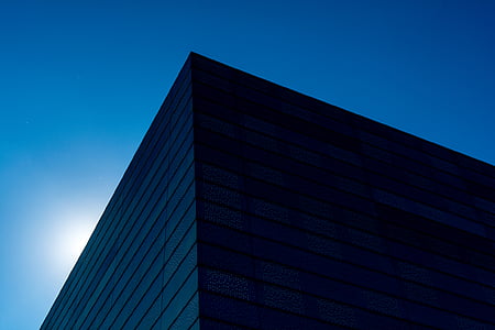 architectural photography of gray building thumbnail