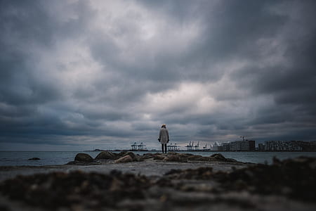 person standing on dock thumbnail